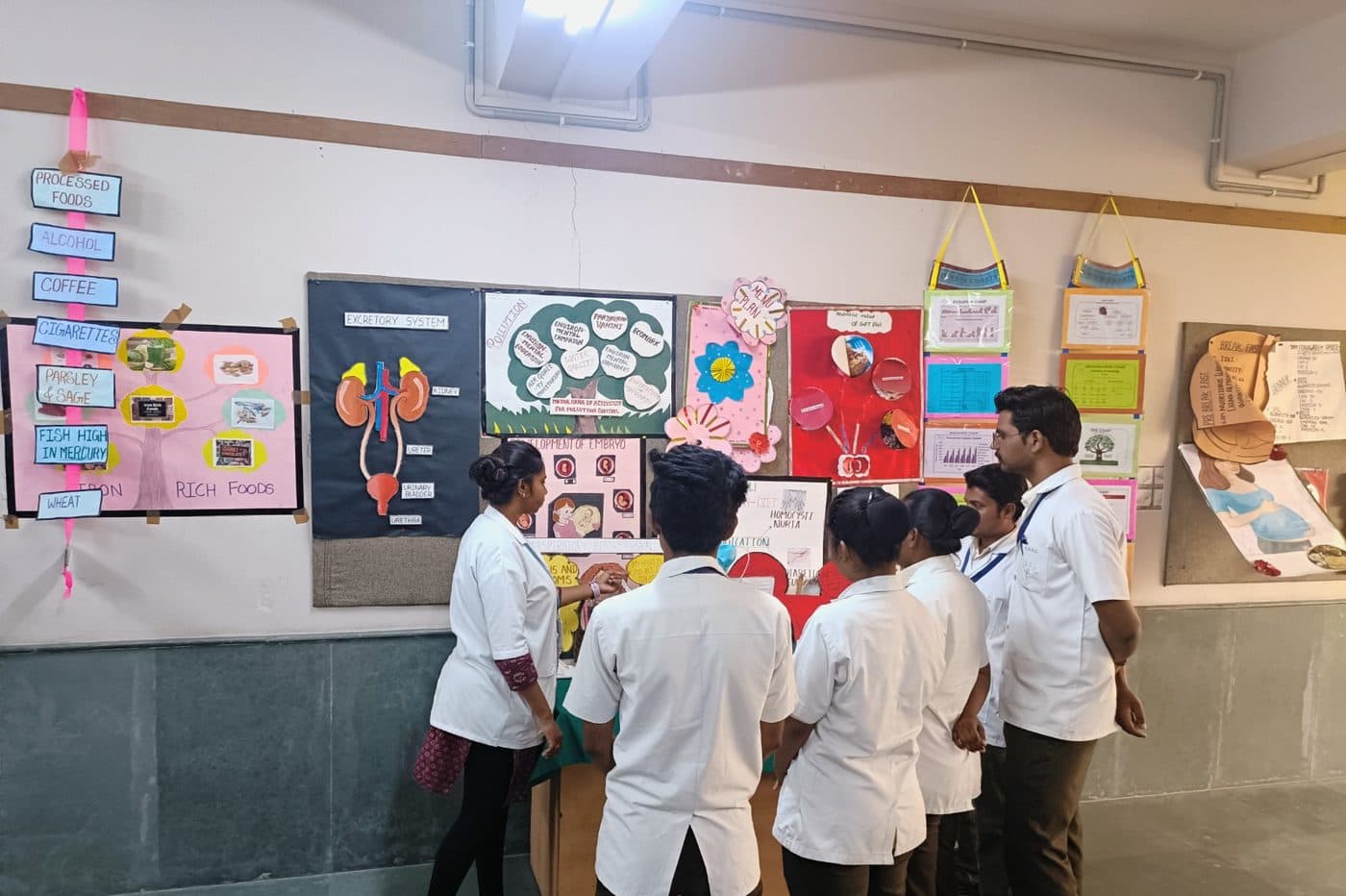 Students presenting health education charts
