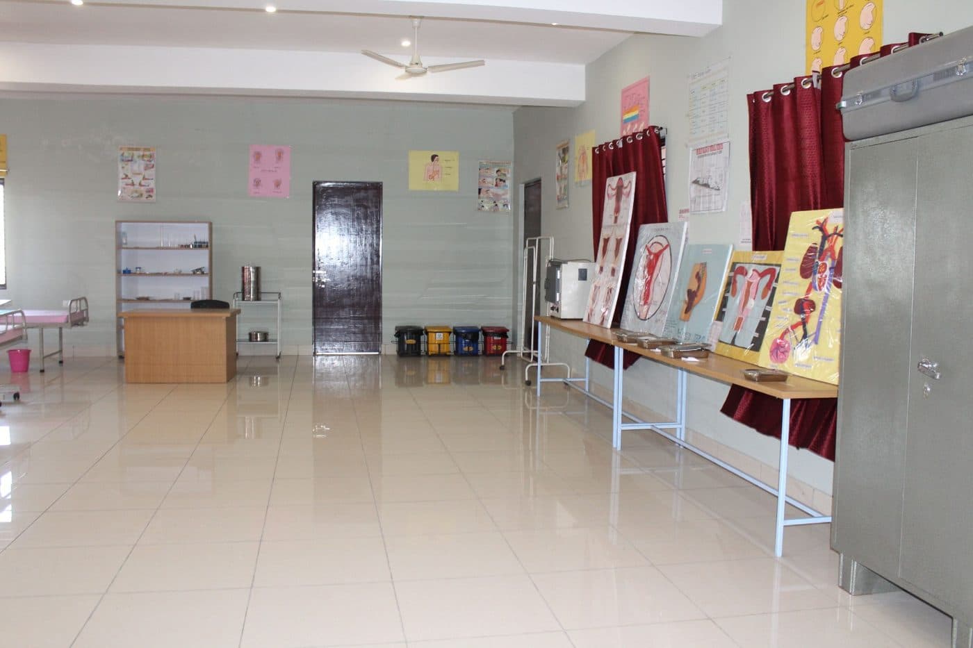 Pre-clinical laboratory with demonstration bed and charts